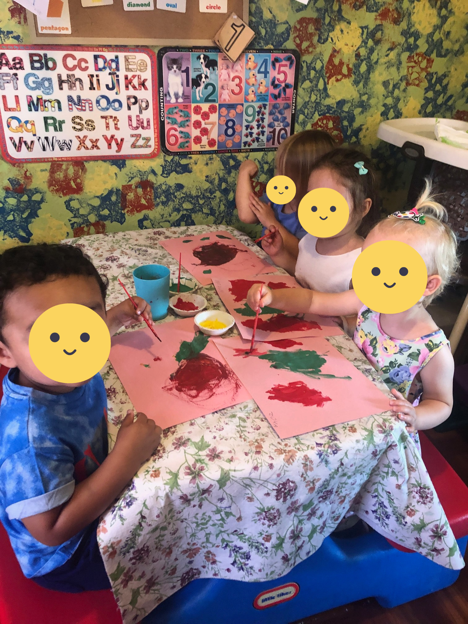 Children painting during class time.